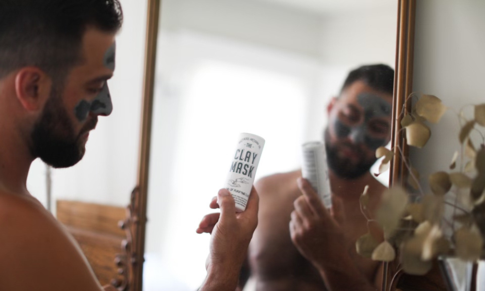 men with activated charcoal mask